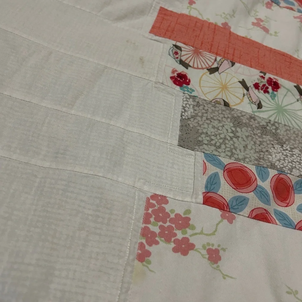 GUC Modern handmade quilt in corals, pinks and greens. Nursery. Needs TLC repair